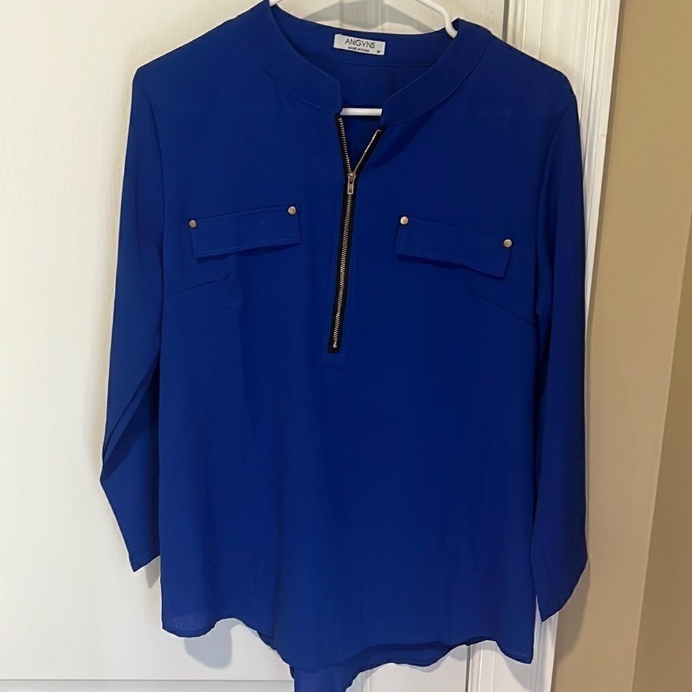 New ANGVNS blue blouse with black detail zipper and pockets